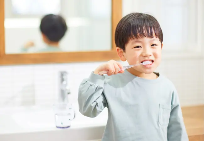 how many times should I brush my teeth