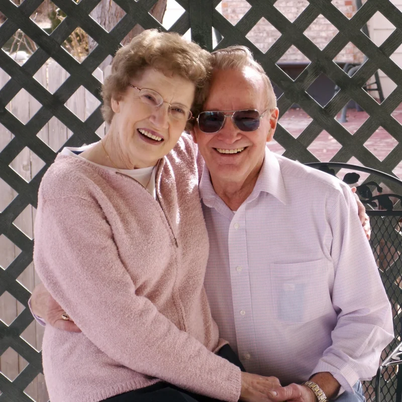 senior couple smiling because of CDCP